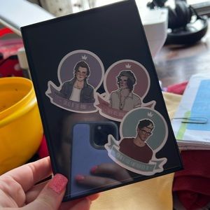 One direction frame with characters inside